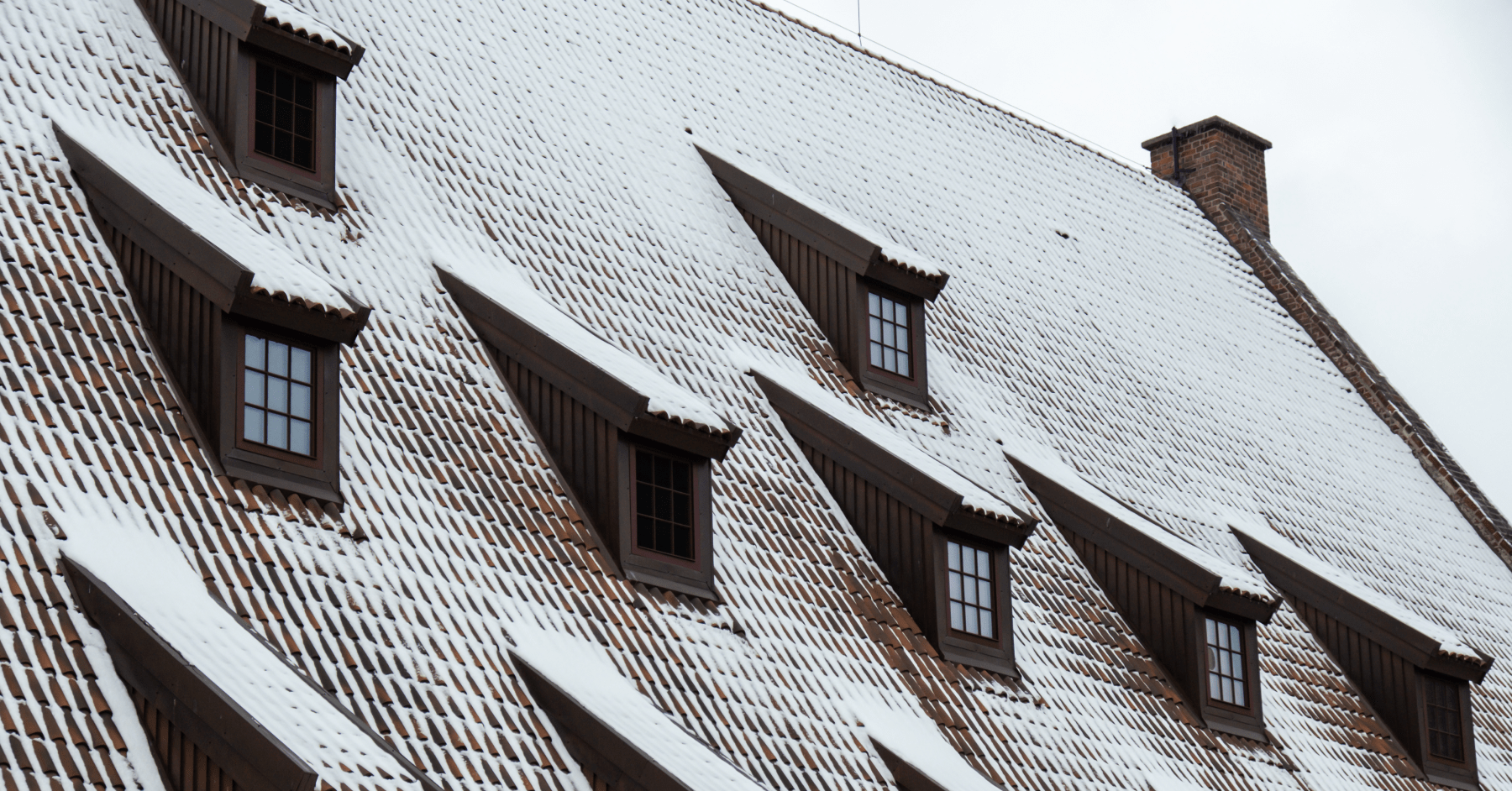commercial steep slope roof maintenance West Side Roofing